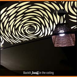 Abstract backlit Jaali in the ceiling processed from MDF in a commercial area copy